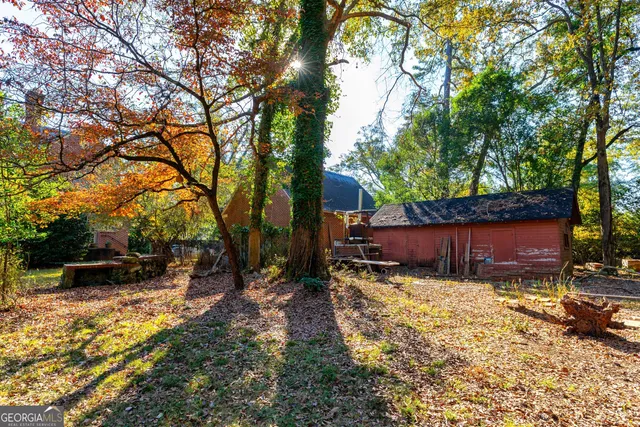 a backyard of a house with lots of green space