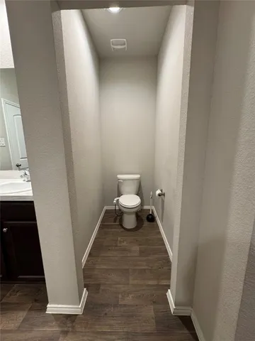 a bathroom with a sink and a toilet