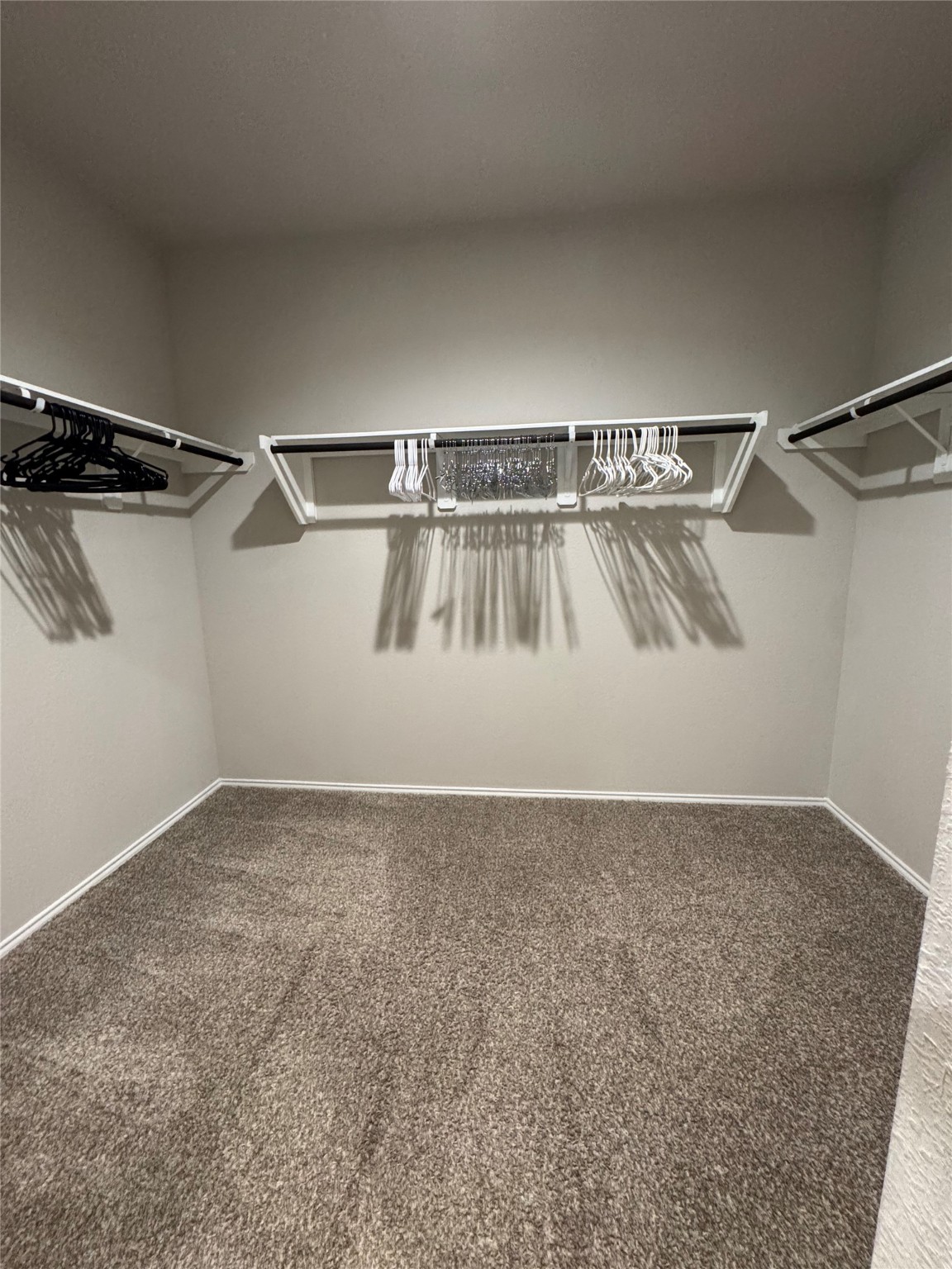 2419 Norwood Stand Trail Spring Spring, TX 77373 - Photo 15 of 21 a view of a room with racks on the wall