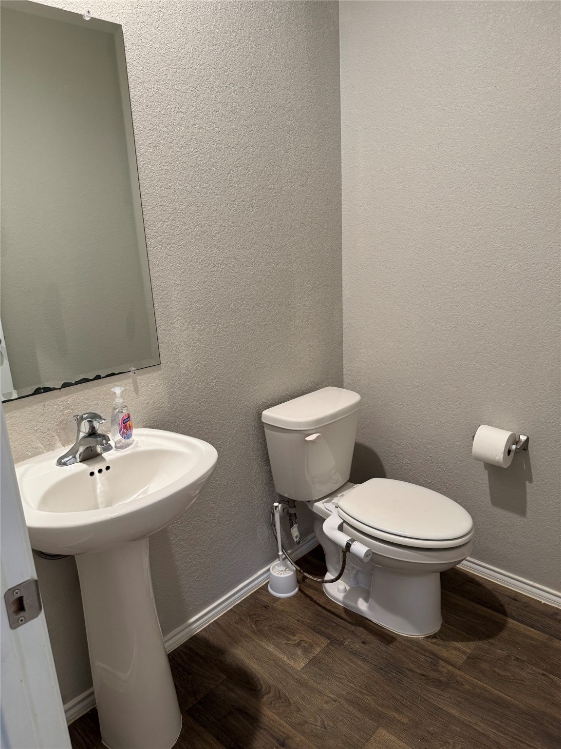 2419 Norwood Stand Trail Spring Spring, TX 77373 - Photo 4 of 21 a white toilet sitting next to a bathroom sink