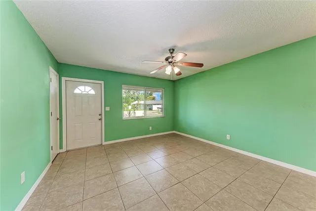 a kitchen with granite countertop a sink stainless steel appliances and cabinets