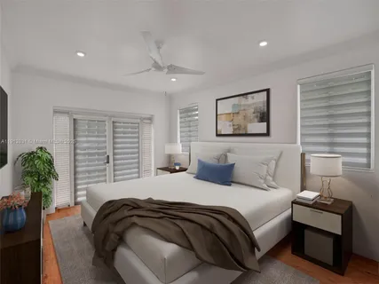 a bedroom with a bed and a couch