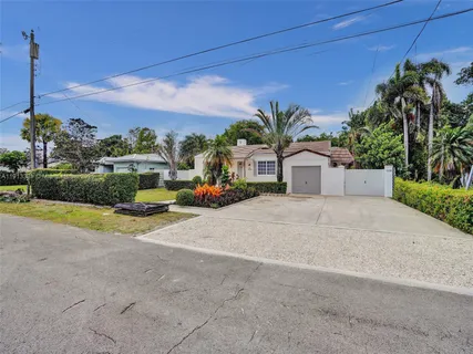 a view of a house with a street