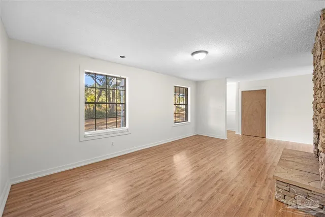 an empty room with windows