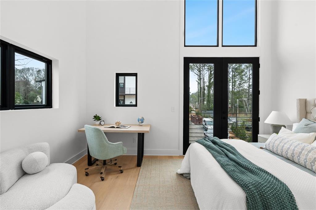 1165 Penny Lane Atlanta, GA 30329 - Photo 25 of 40 a bedroom with a bed and a window