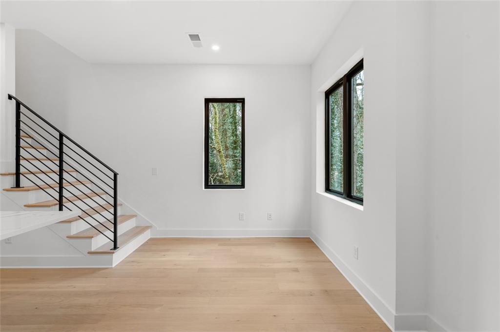 1165 Penny Lane Atlanta, GA 30329 - Photo 6 of 40 an empty room with windows