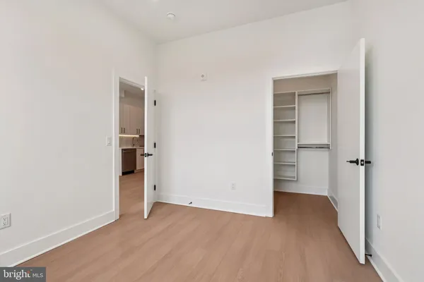 an empty room with closet