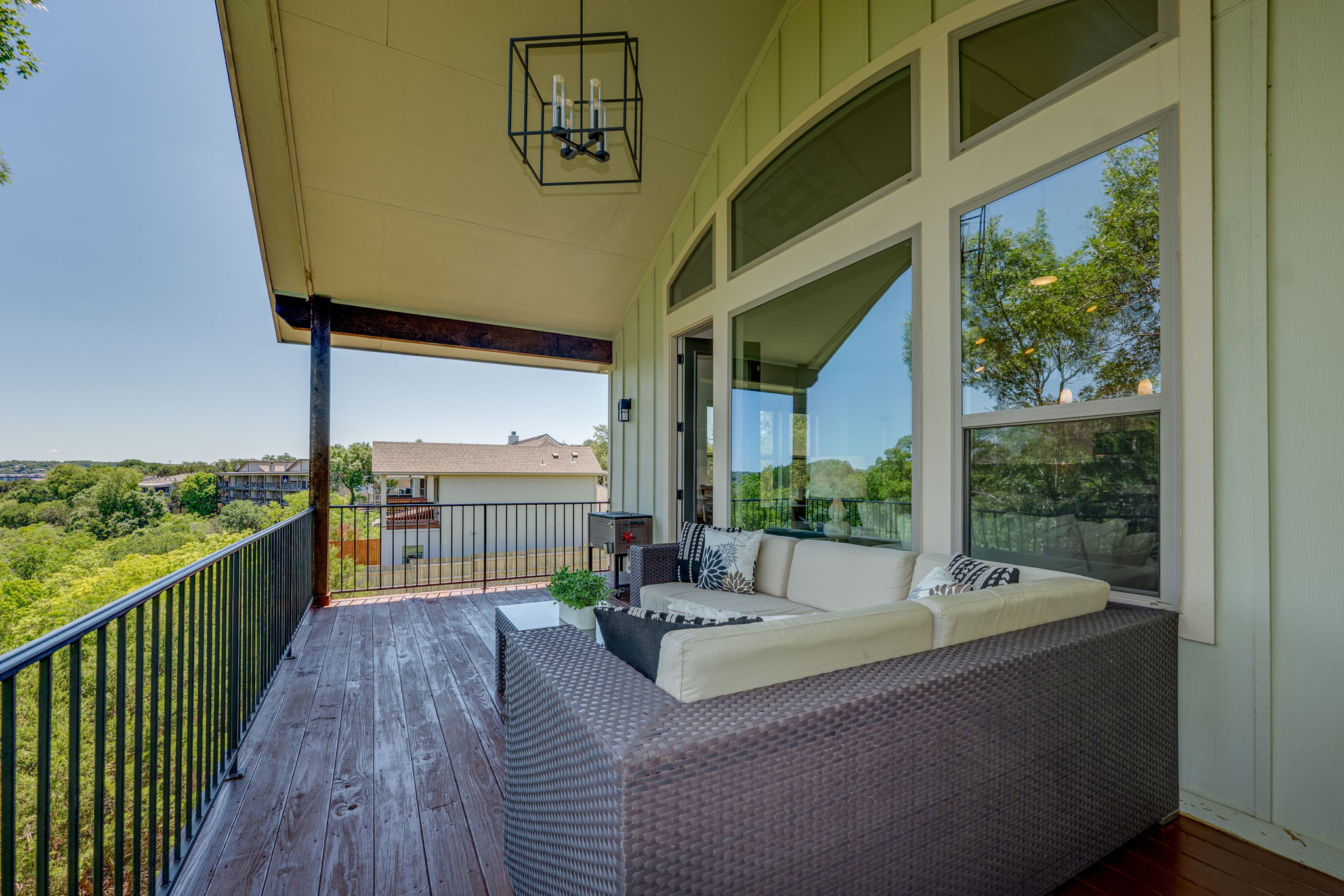 433 Venture Boulevard South Point Venture, TX 78645 - Photo 24 of 36 The upper deck has plenty of space for lounging and grilling.