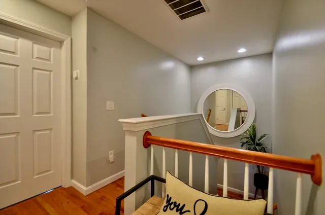 a view of a hallway with a workspace