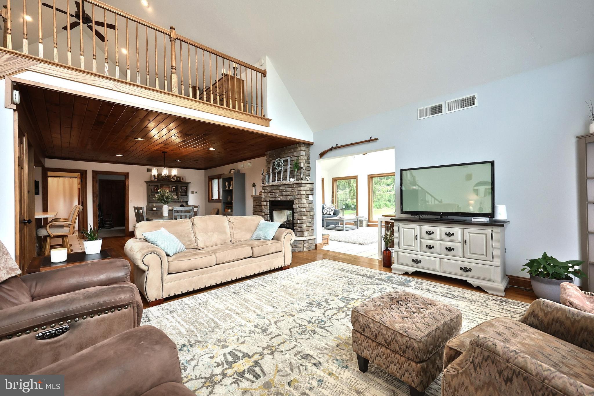 312 Knox Road Gettysburg, PA 17325 - Photo 24 of 50 a living room with furniture and a flat screen tv