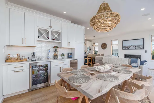 a kitchen with a table and chairs in it