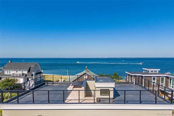 an aerial view of residential houses with wooden floor