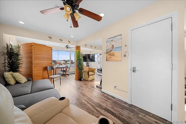 a kitchen with stainless steel appliances granite countertop a refrigerator sink and stove