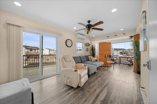 a bathroom with a toilet sink and a mirror