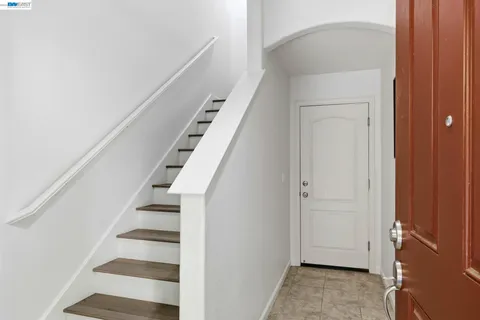a view of entryway with stairs