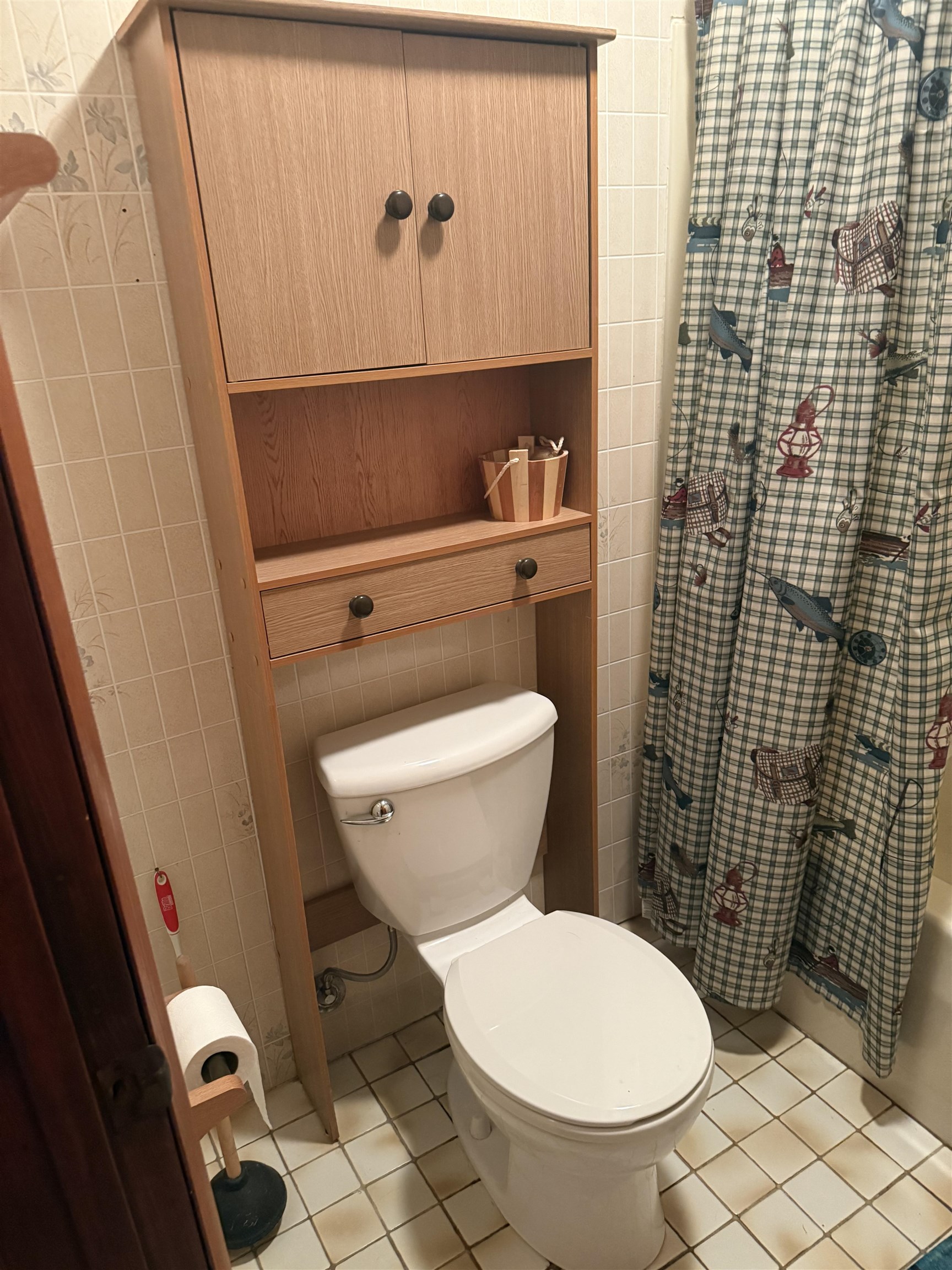 63380 Trout Lake Road Iron River, WI 54847 - Photo 30 of 36 Full bathroom with light tile patterned floors, tile walls, and shower / bathtub combination with curtain