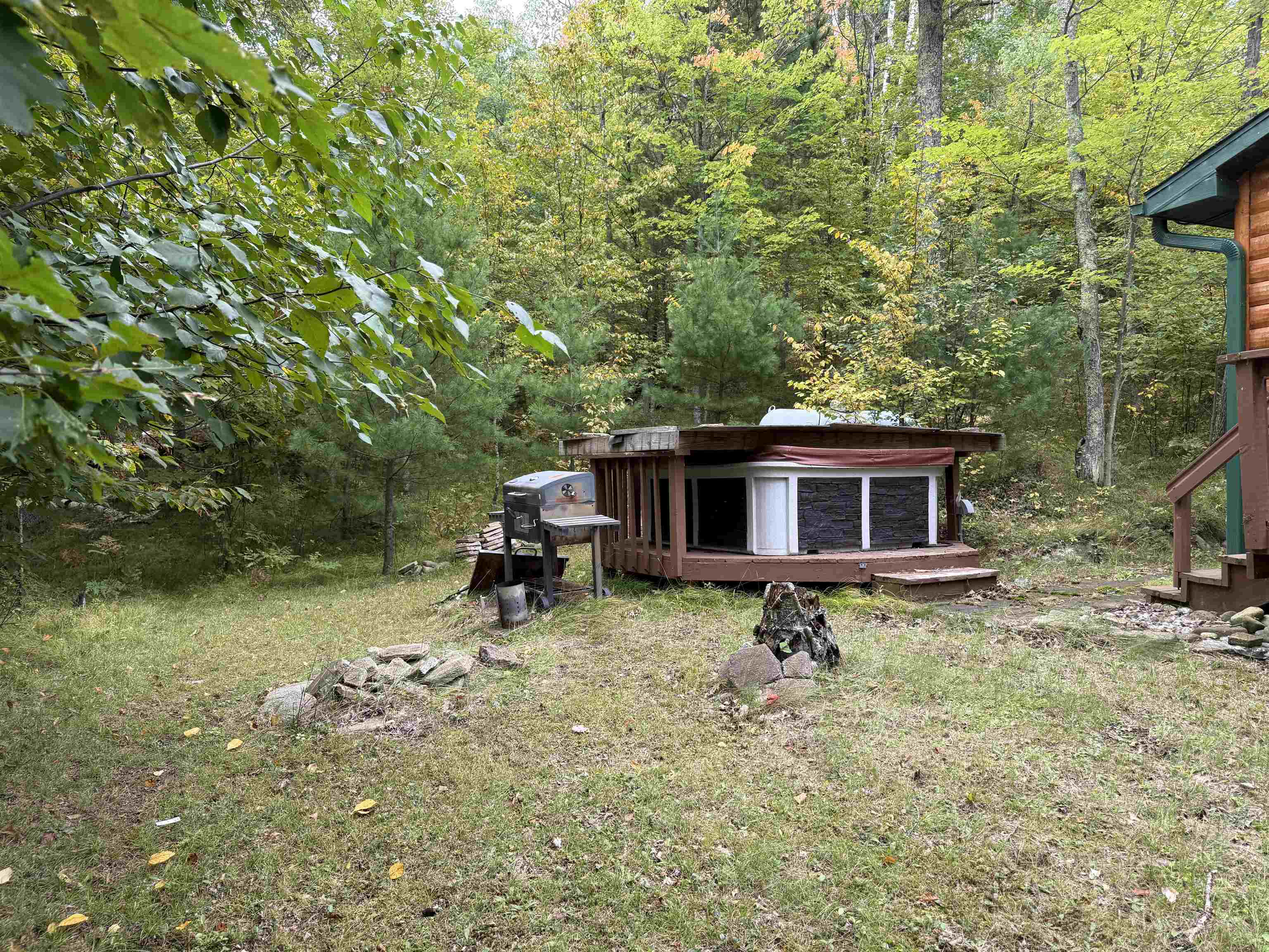 63380 Trout Lake Road Iron River, WI 54847 - Photo 33 of 36 View of yard featuring a wooden deck