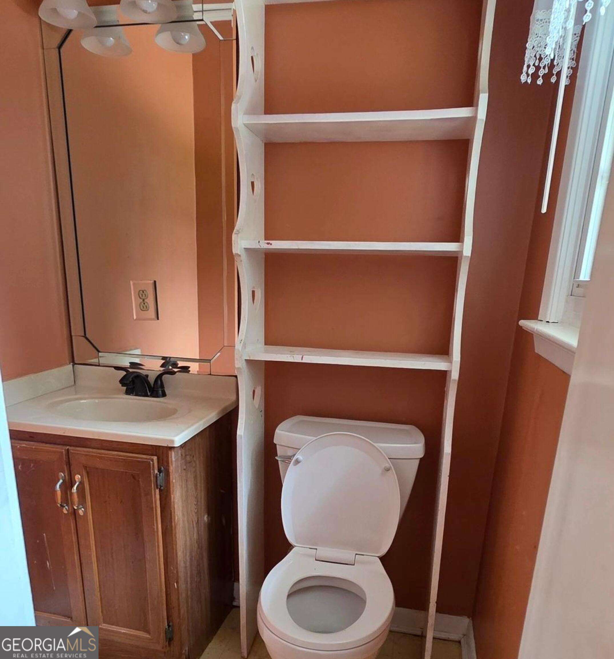 110 Lee Street Centerville, GA 31028 - Photo 9 of 16 a bathroom with a toilet and a sink
