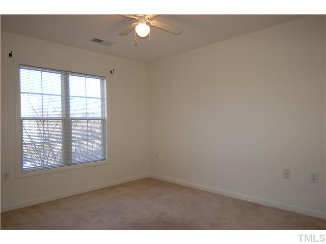 2510 Huntscroft Lane, Unit 203 Raleigh, NC 27617 - Photo 11 of 12 a view of an empty room with a window