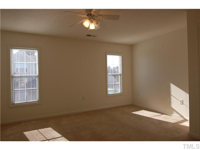 2510 Huntscroft Lane, Unit 203 Raleigh, NC 27617 - Photo 8 of 12 a view of an empty room with a window
