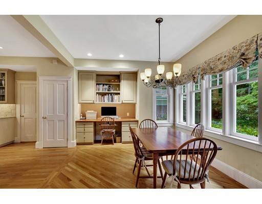 29 McCall Road Winchester, MA 01890 - Photo 20 of 42 a view of a dining room with furniture window and outside view