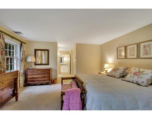 29 McCall Road Winchester, MA 01890 - Photo 33 of 42 a bedroom with a bed and cabinets