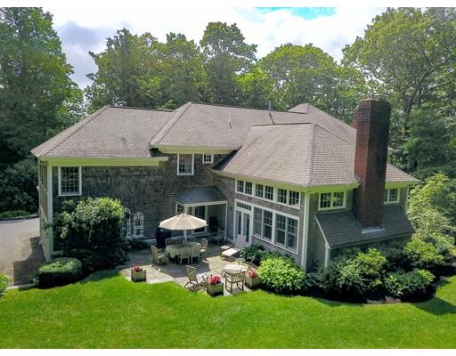 29 McCall Road Winchester, MA 01890 - Photo 42 of 42 a aerial view of a house with a garden and plants