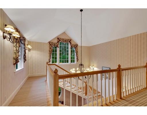 29 McCall Road Winchester, MA 01890 - Photo 7 of 42 a view of entryway and hall with wooden floor