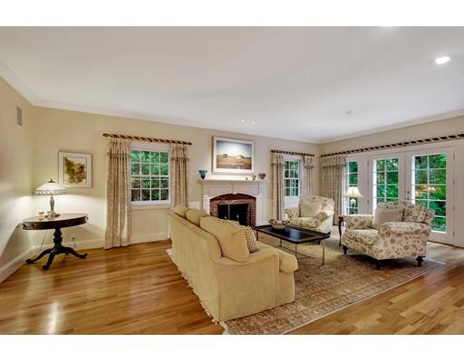 29 McCall Road Winchester, MA 01890 - Photo 8 of 42 a living room with furniture large window and table