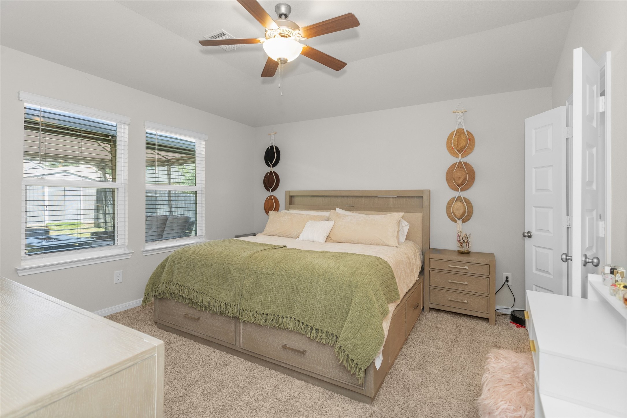 18544 Meadow Point Lane Montgomery, TX 77316 - Photo 23 of 35 a bedroom with a bed and a window