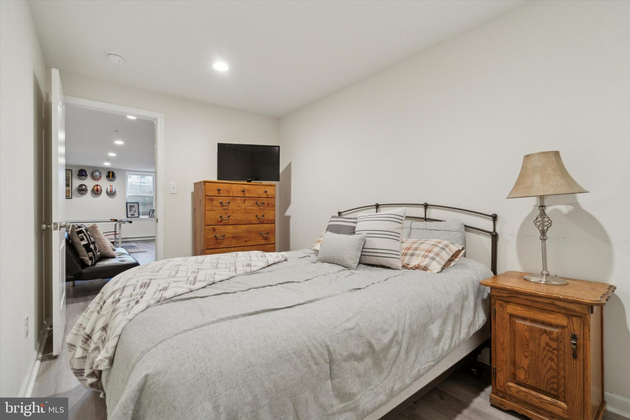 400 North York Road, Unit B Hatboro, PA 19040 - Photo 25 of 29 a bedroom with a bed and a television
