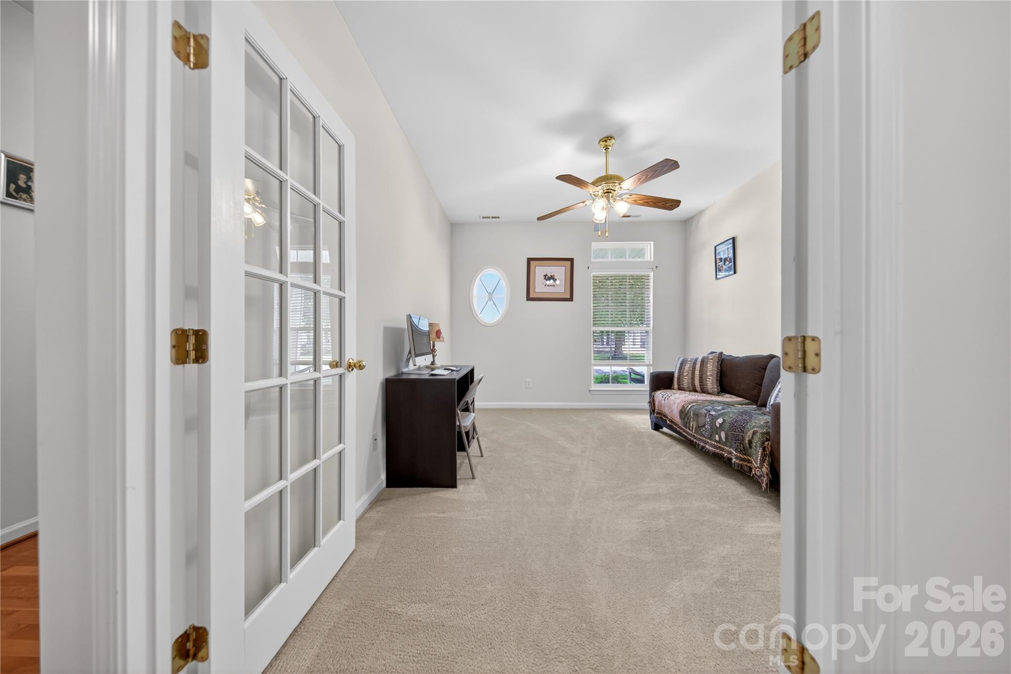 533 Fair Oaks Drive Fort Mill, SC 29708 - Photo 26 of 33 a living room with furniture flowerpot and a chandelier
