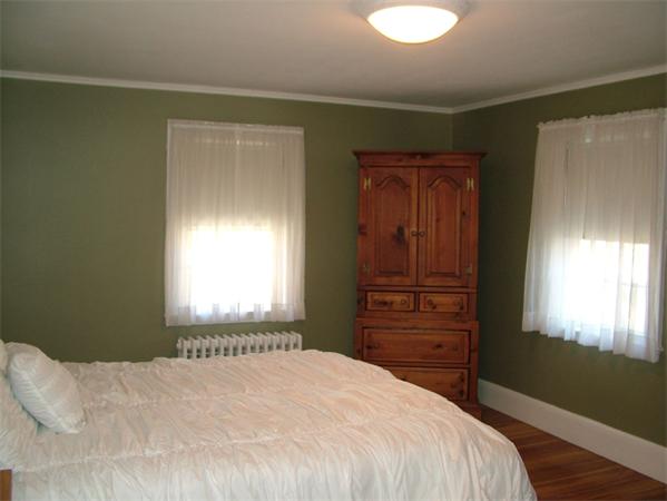 28 Pickwick Road Marblehead, MA 01945 - Photo 14 of 19 a bedroom with a bed and a window