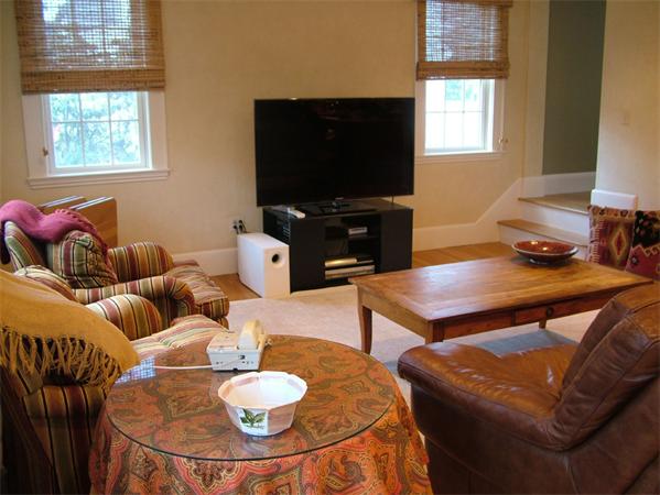 28 Pickwick Road Marblehead, MA 01945 - Photo 5 of 19 a living room with furniture a flat screen tv and a window