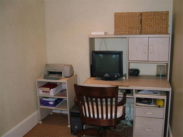 28 Pickwick Road Marblehead, MA 01945 - Photo 7 of 19 a kitchen with a stove and a microwave