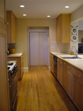 28 Pickwick Road Marblehead, MA 01945 - Photo 9 of 19 a kitchen with stainless steel appliances granite countertop a sink a stove and a refrigerator