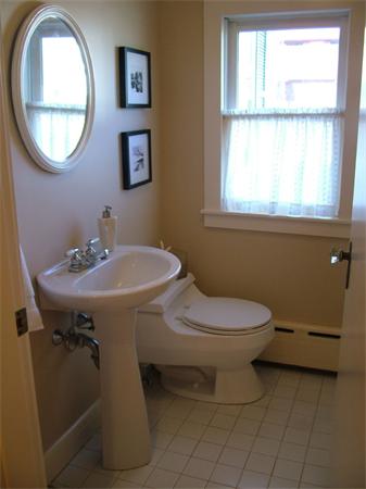 28 Pickwick Road Marblehead, MA 01945 - Photo 10 of 19 a bathroom with a toilet a sink and a mirror