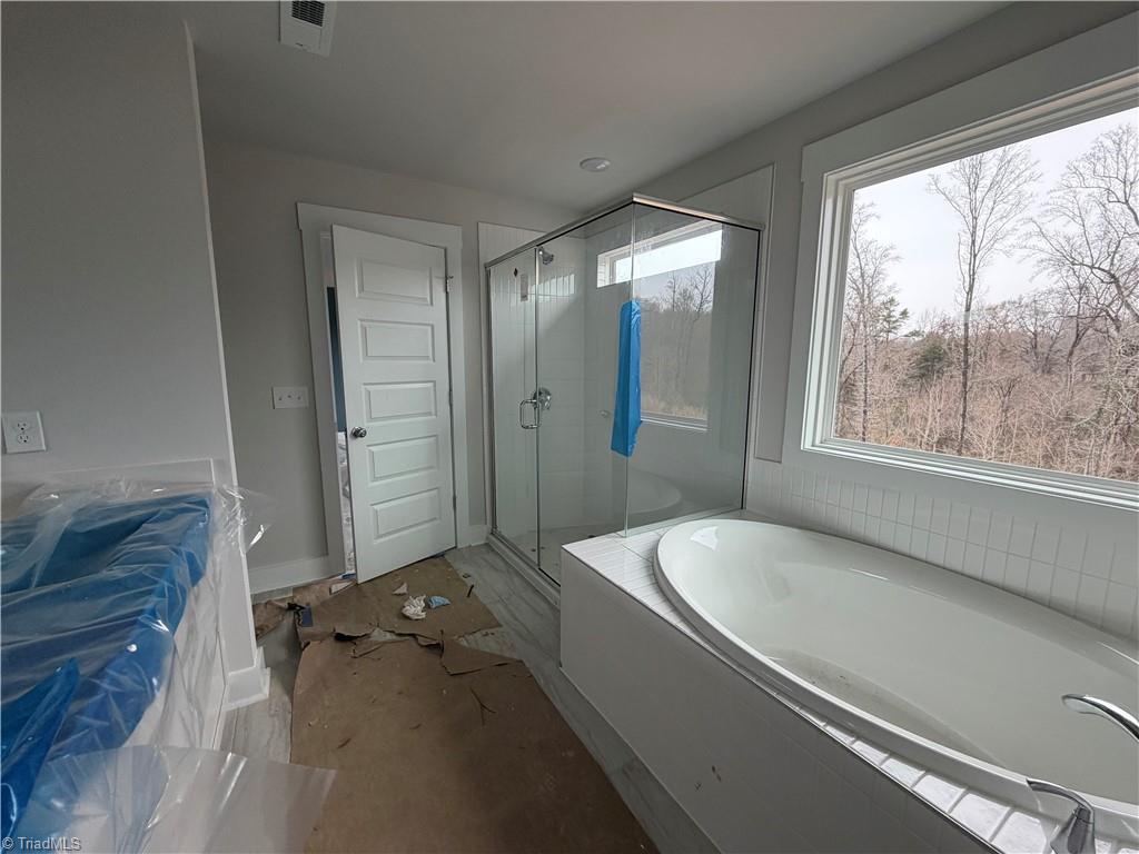 5456 Rock Valley Drive Trinity, NC 27370 - Photo 6 of 24 Upgraded spa bath overlooking nature