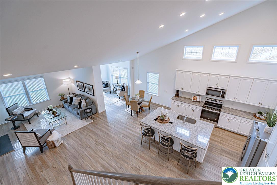 3855 Victors Way Easton, PA 18045 - Photo 12 of 47 a living room with furniture and wooden floor