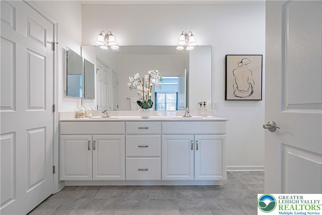 3855 Victors Way Easton, PA 18045 - Photo 29 of 47 a bathroom with a sink vanity and mirror