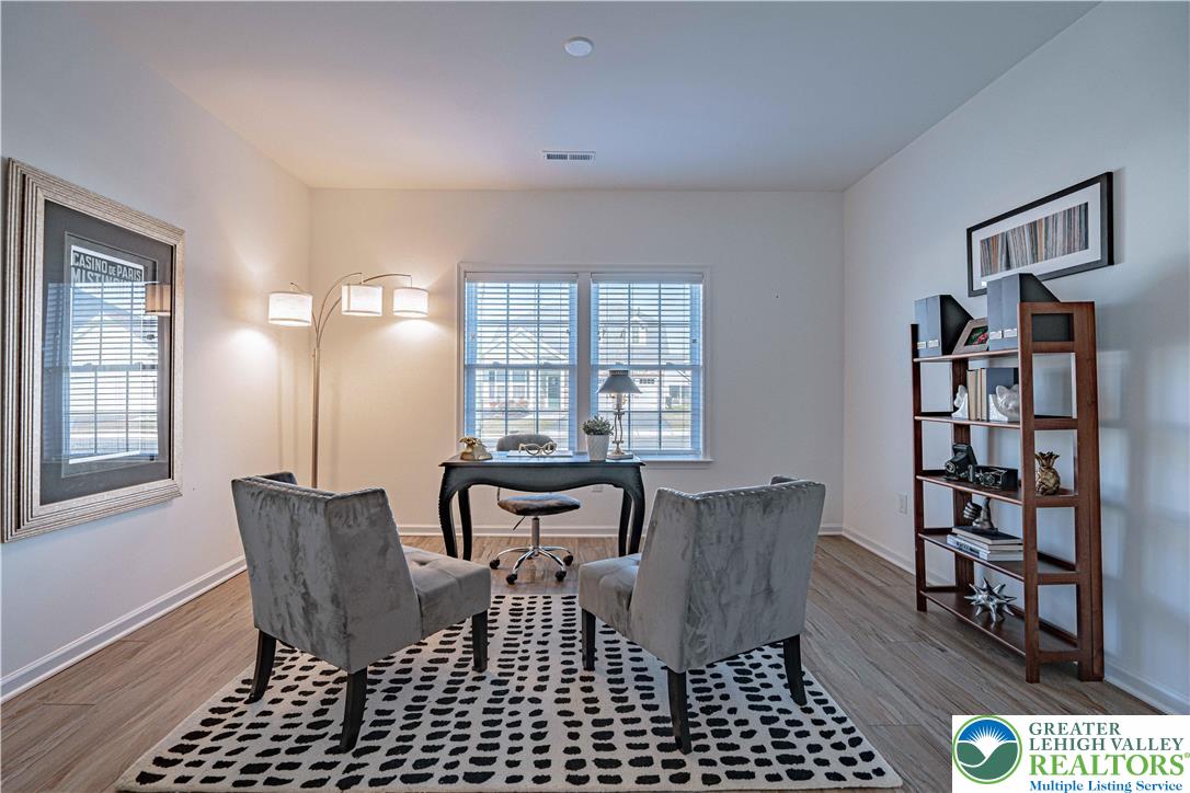 3855 Victors Way Easton, PA 18045 - Photo 7 of 47 a view of a workspace with furniture and a window