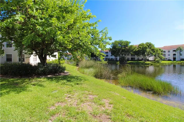 a view of a lake with houses