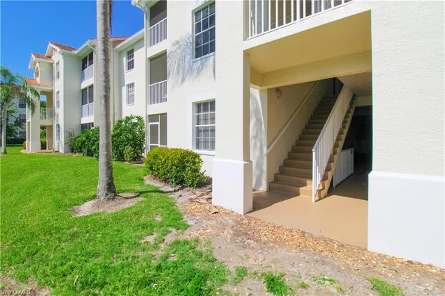 a view of residential houses with lake view