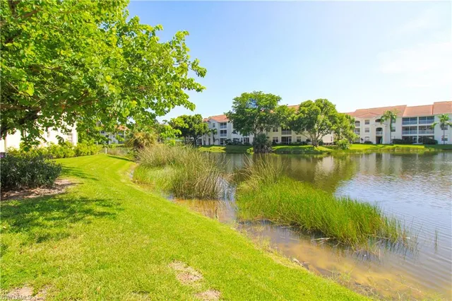 a view of an house with backyard space and garden