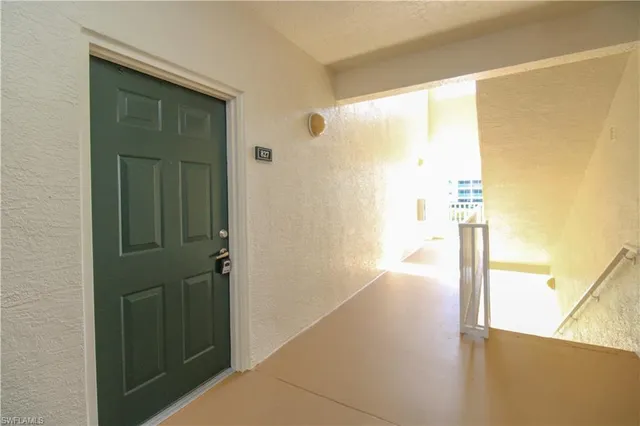 a view of balcony with wooden floor