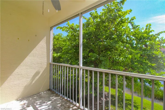 a view of a balcony with plant