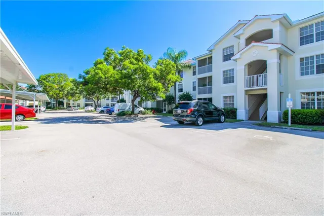 a car parked in front of a building