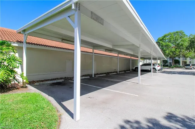 a car parked in front of brick building