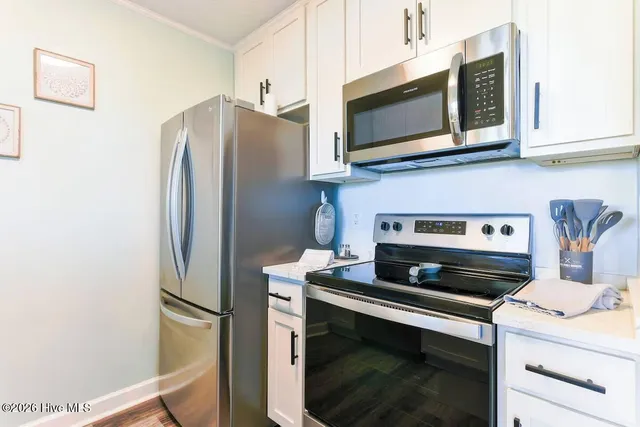 $465,000 | 302 Canal Drive, Unit 13, Carolina Beach, NC 28428