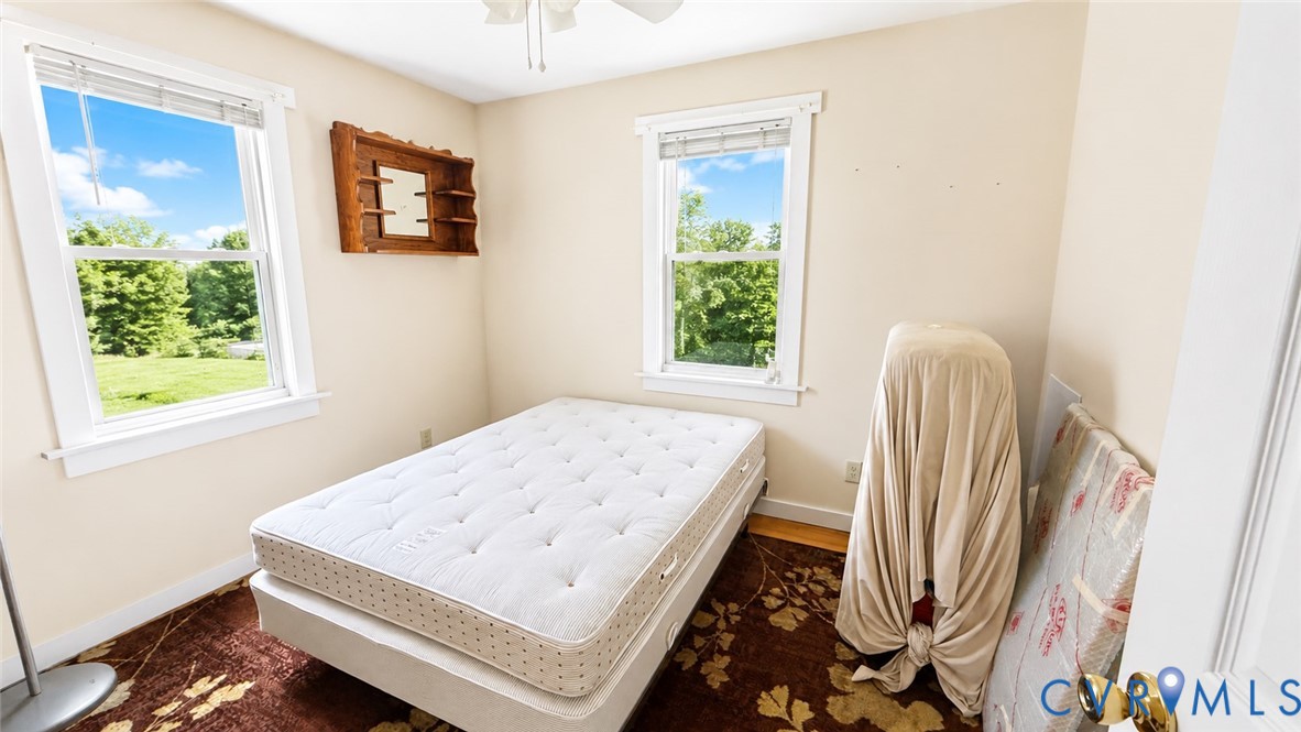 5560 West Hoover Road Reva, VA 22735 - Photo 27 of 32 Bright room featuring two windows with white trim,